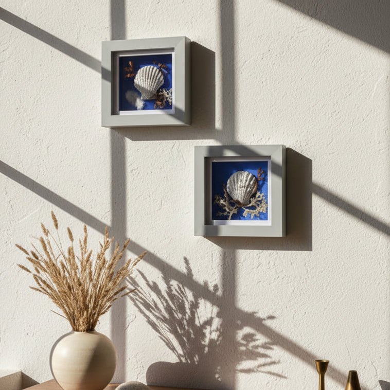 Pair of Coastal framed Still Natures on a light textured wall