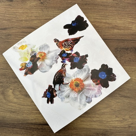 Floral white card with Partridges on a wooden surface